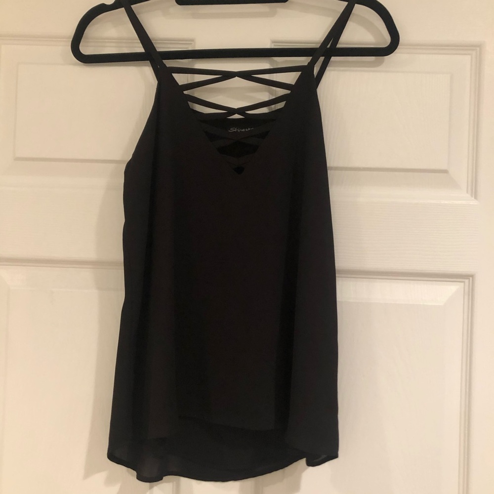 Black Criss across tank top